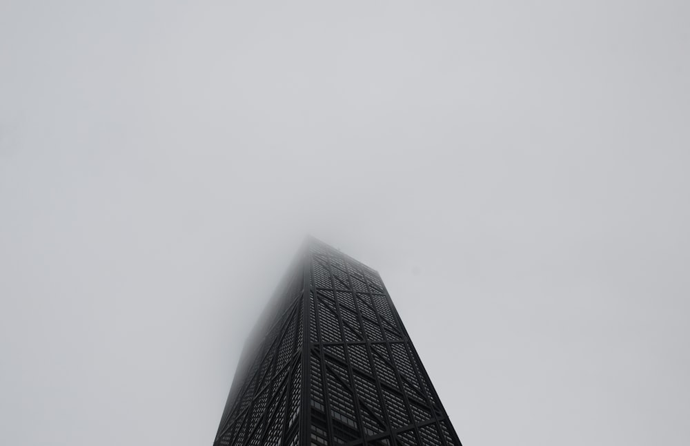 black high rise building under white sky