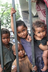 Kids exploring a city park during an afternoon activity, curious and engaged.