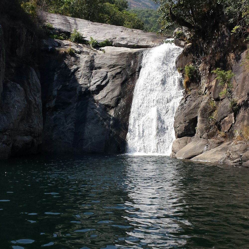 water falls on rocky mountain