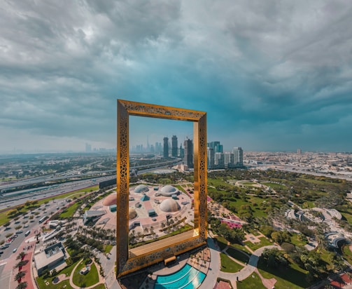 brown wooden framed mirror on top of a building