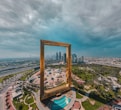 brown wooden framed mirror on top of a building
