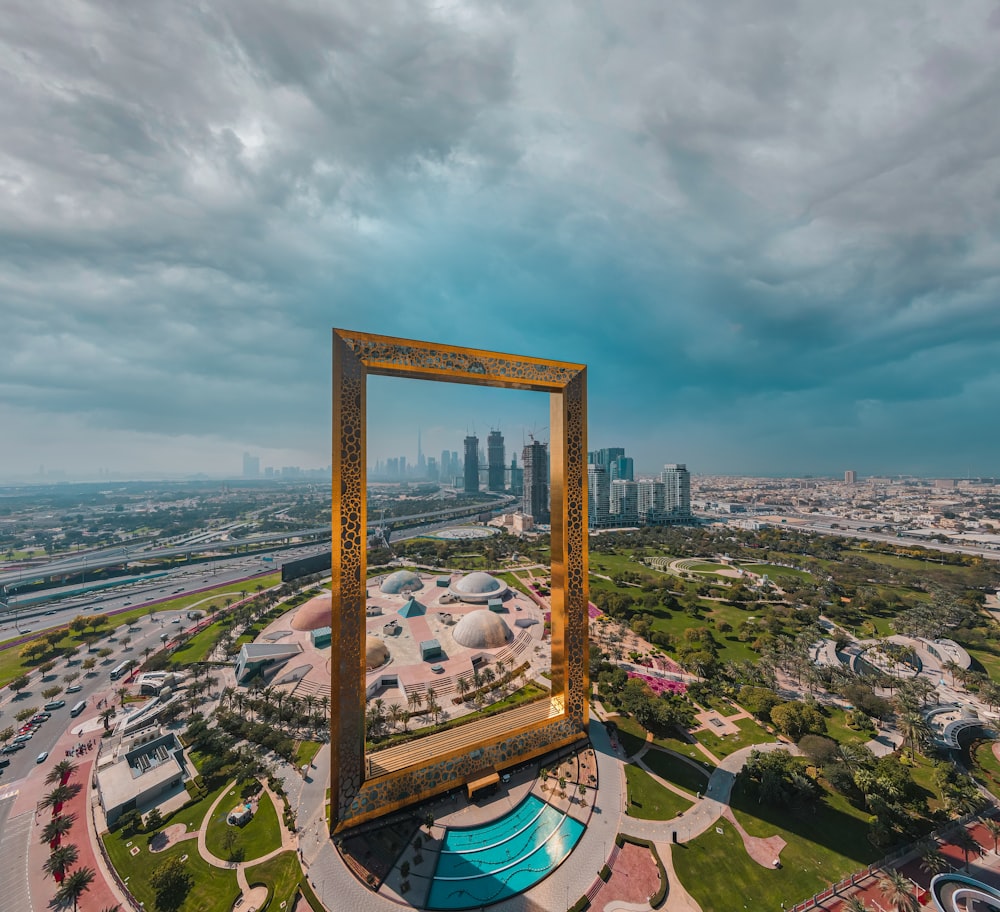 brown wooden framed mirror on top of a building