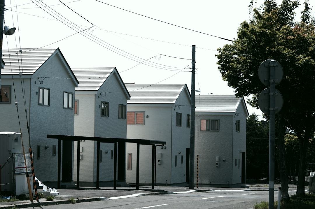 white and gray concrete house,