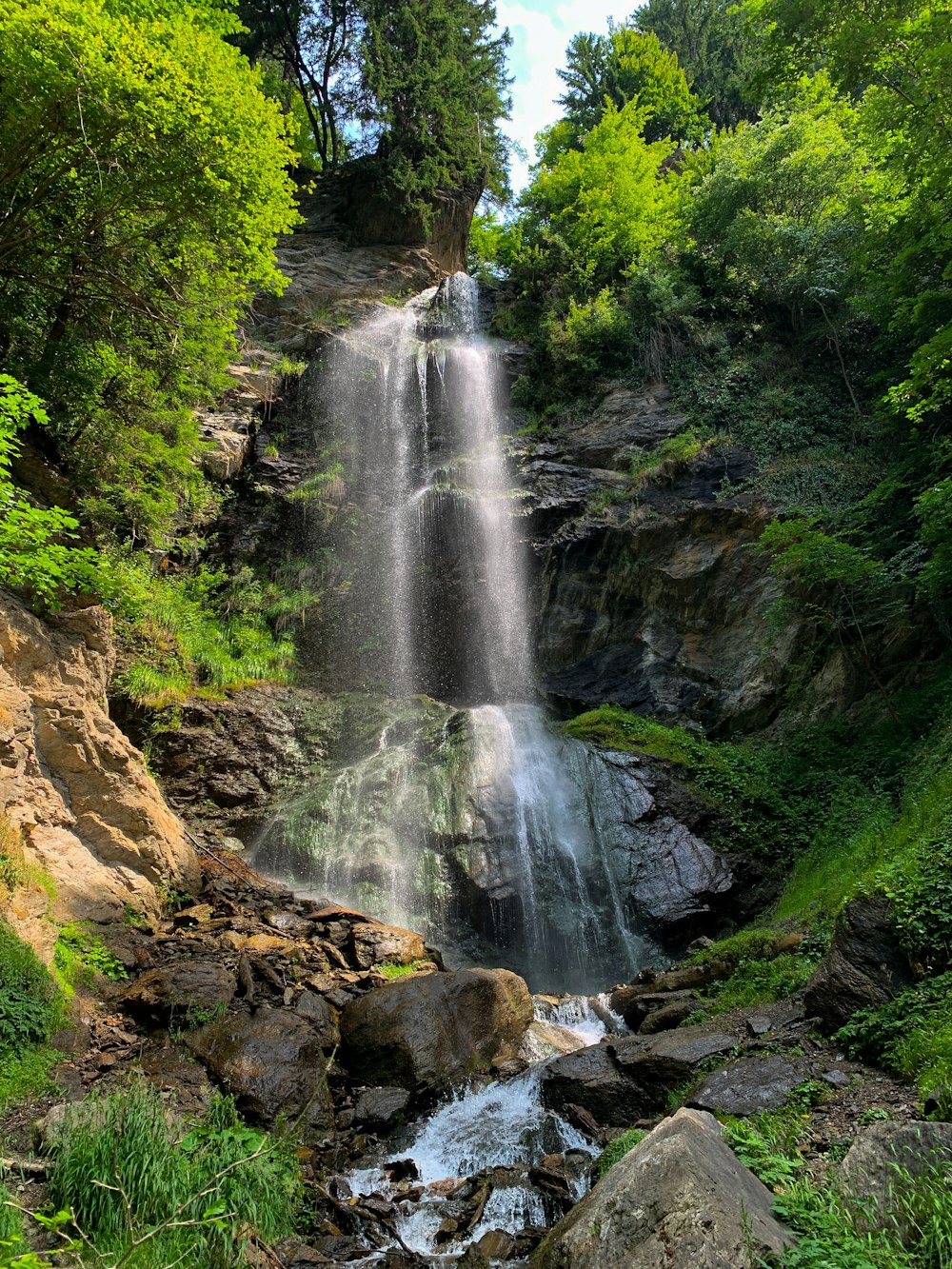 waterfalls in the middle of the forest