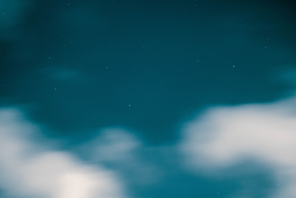 blue and white sky during night time