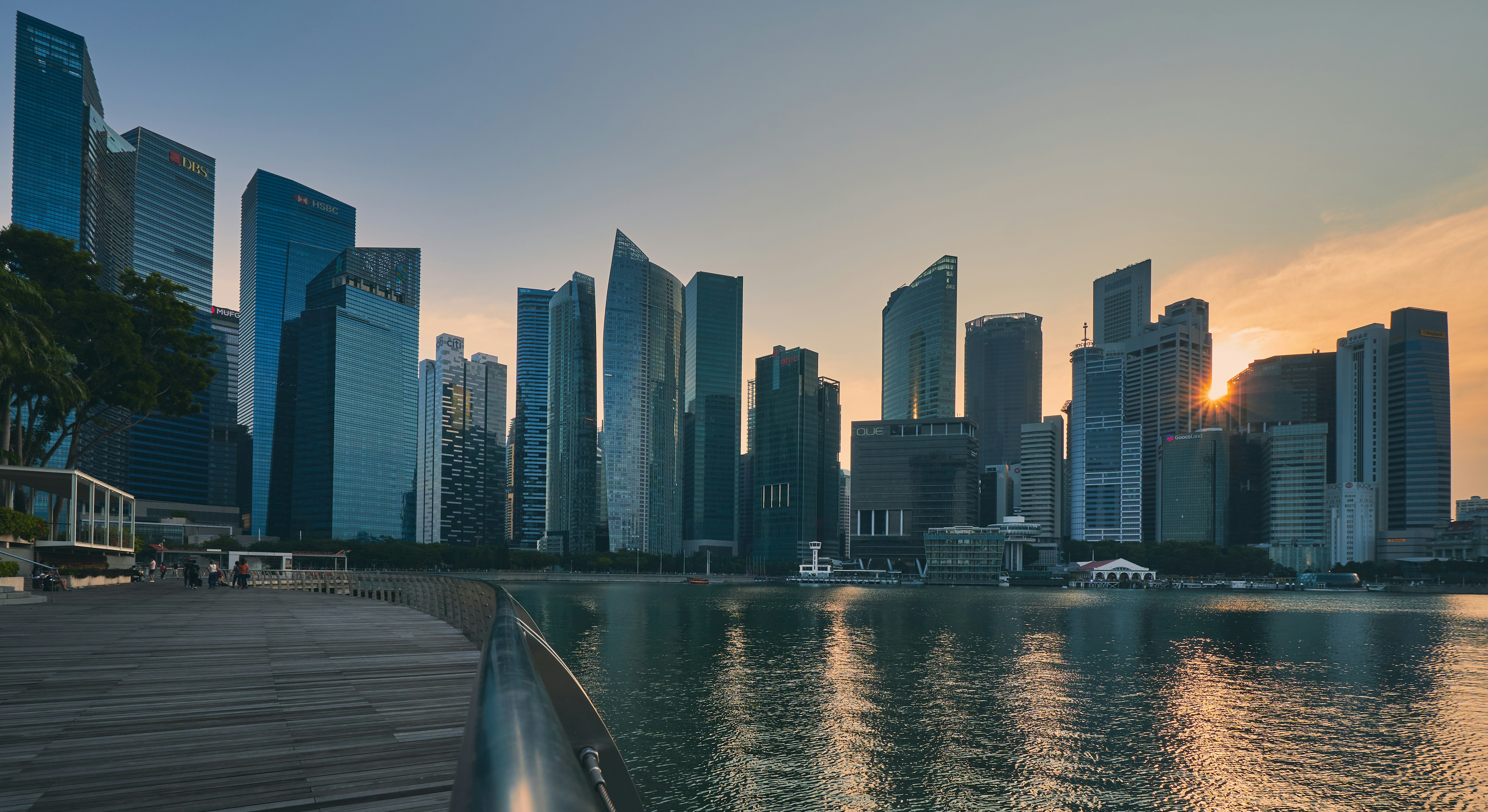 city skyline across body of water during daytime, Singapore Skyscrapers 