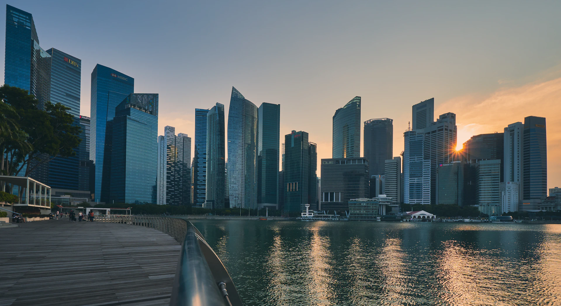 city skyline across body of water during daytime
