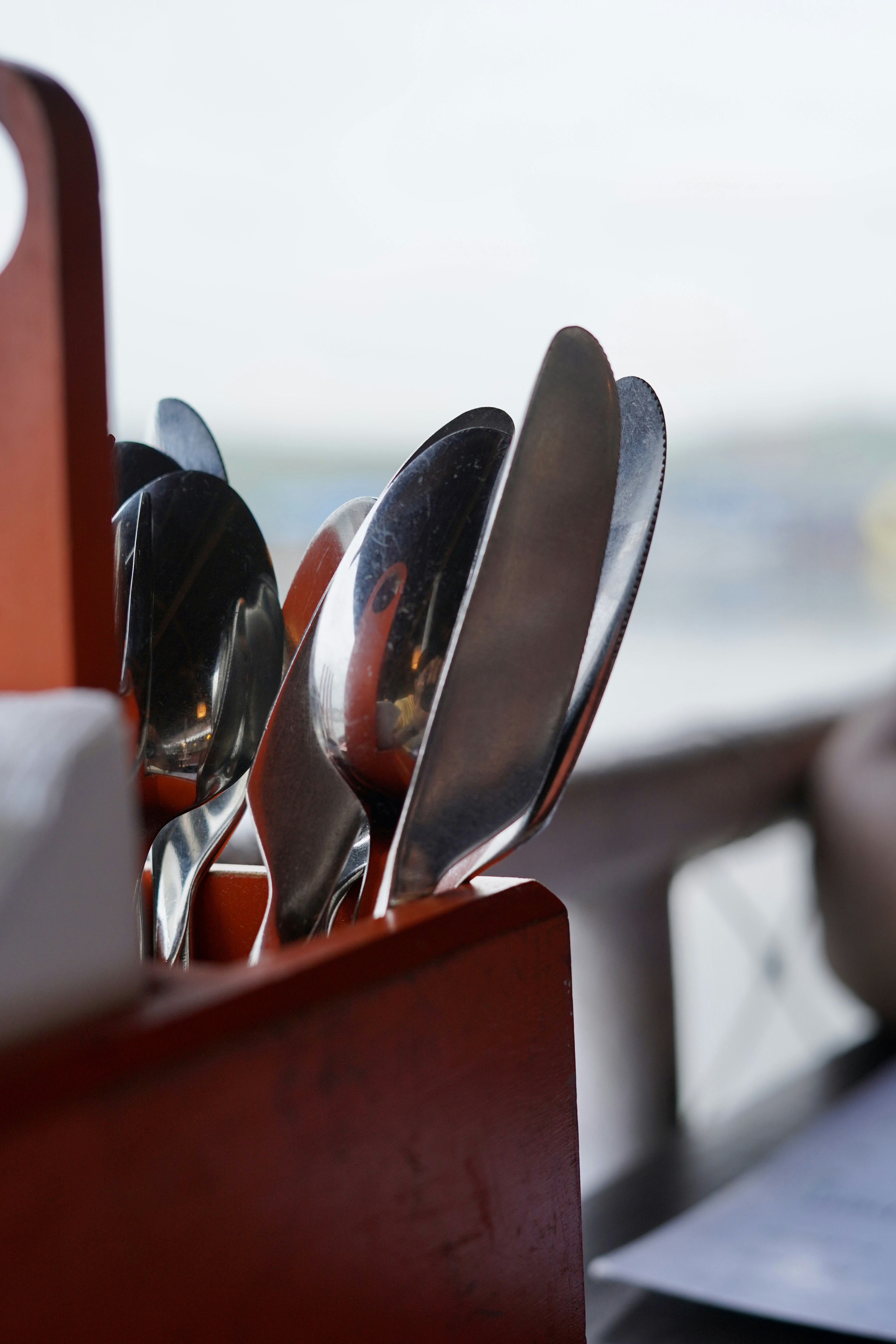 silver spoon on red table