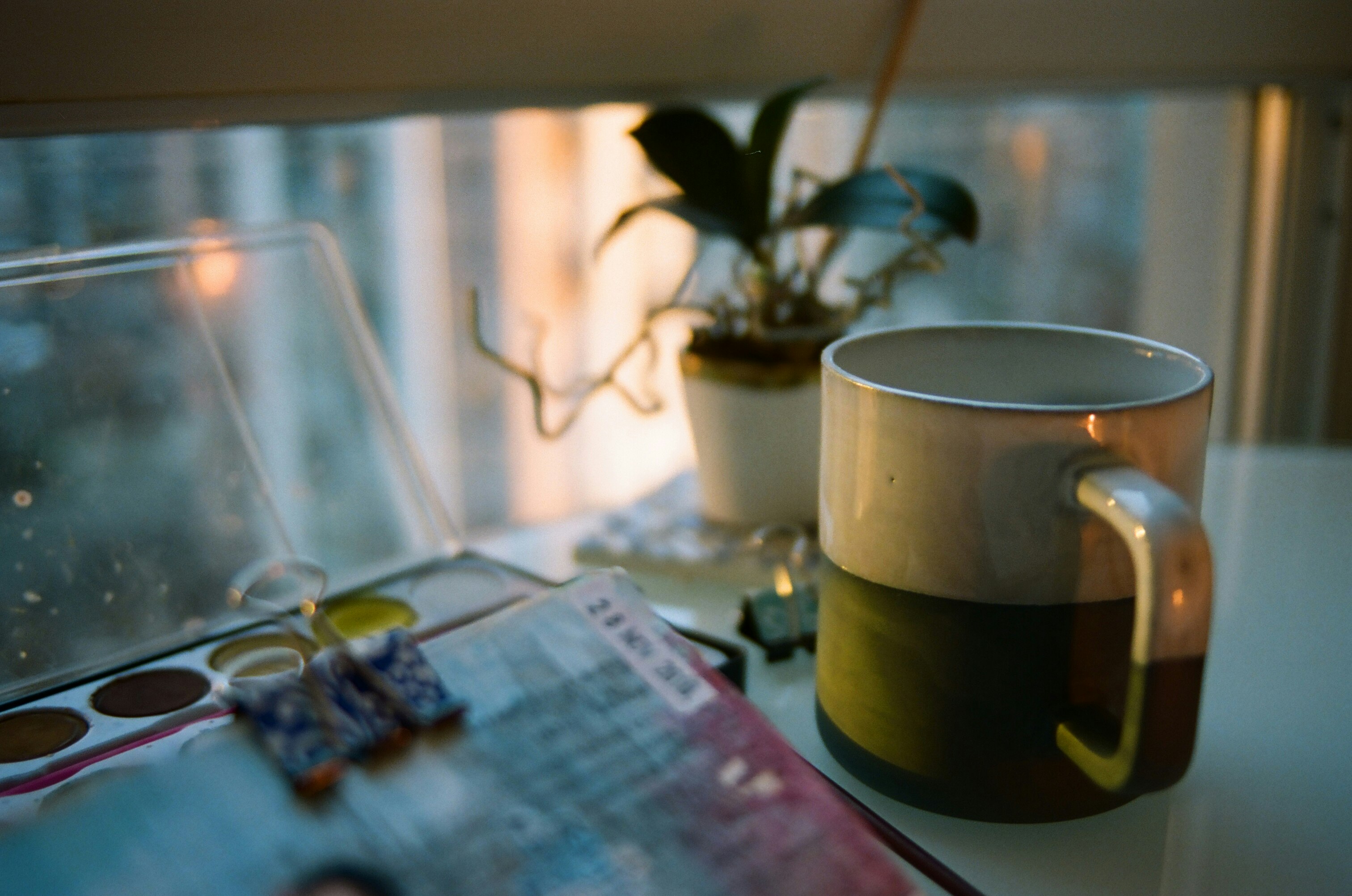 white ceramic mug on table