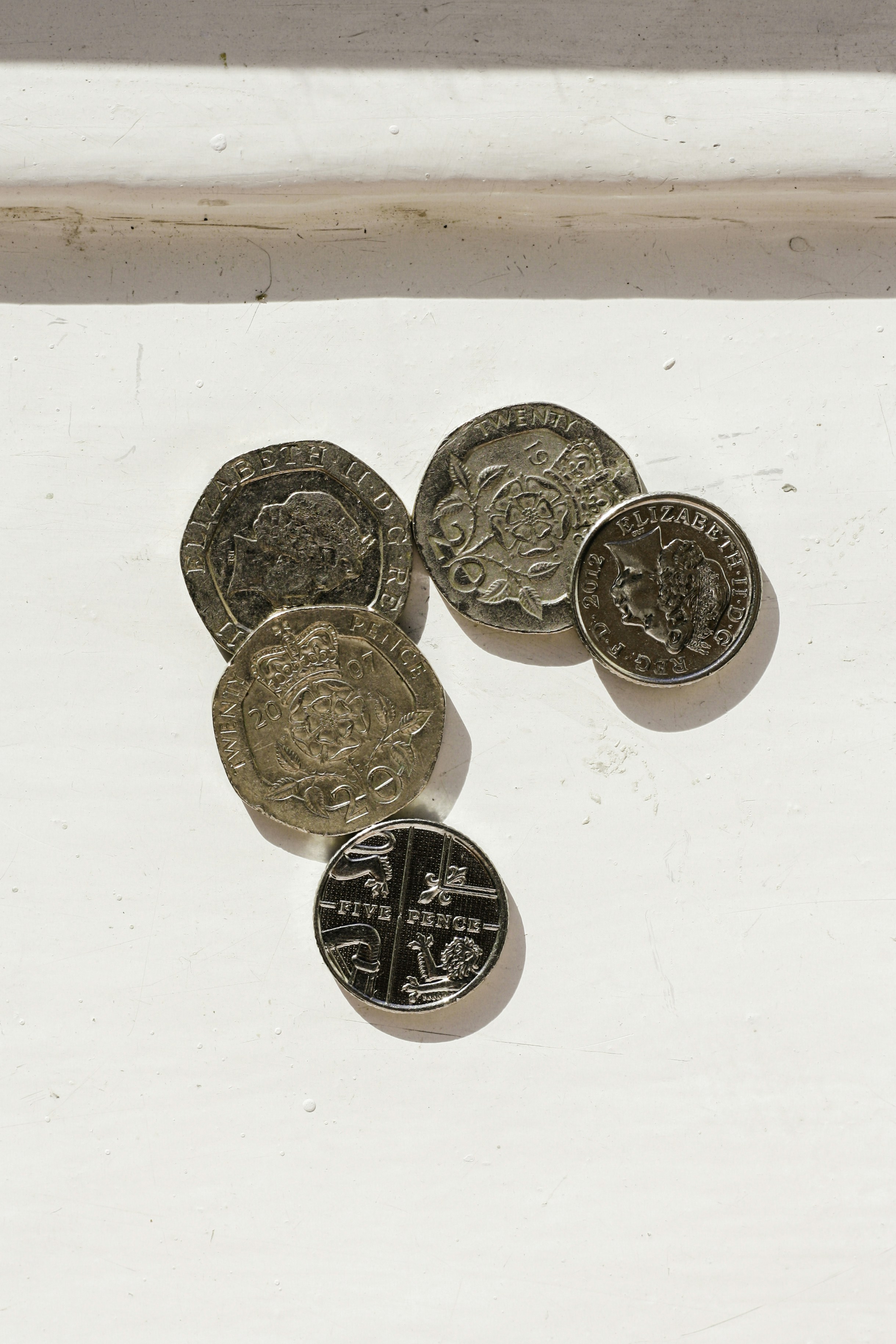 Seventy pence in twenty pence and five pence pieces in British money