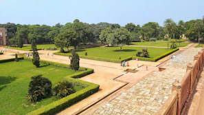 Well-maintained garden area with walking paths and seating