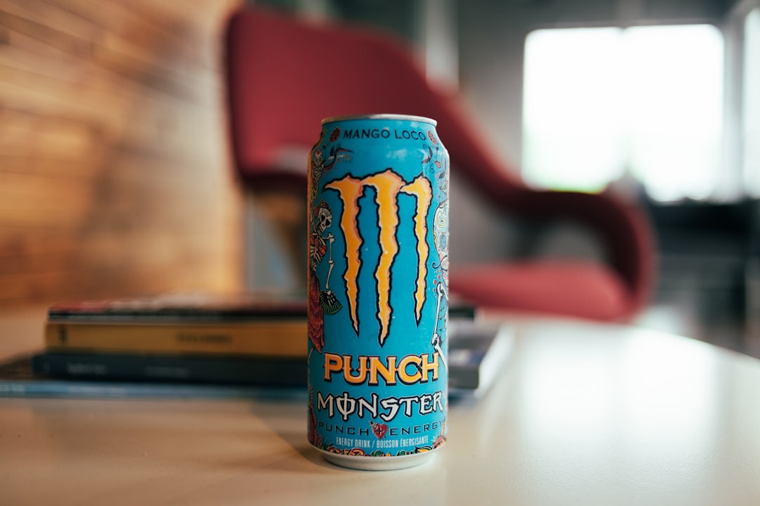 blue and white monster energy drink can