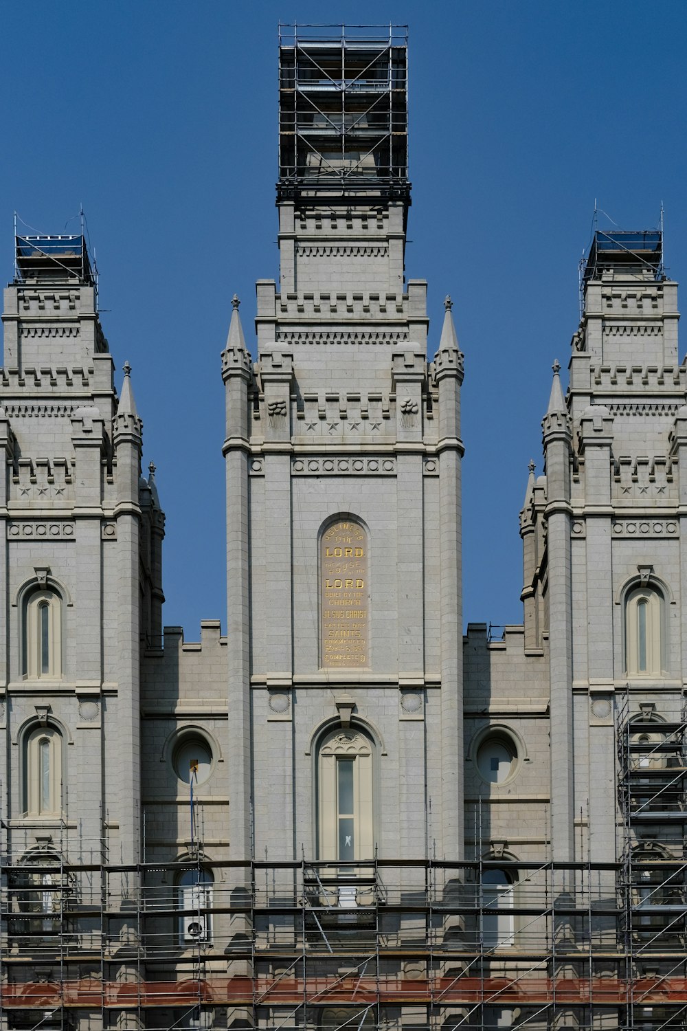 white concrete building under blue sky during daytime