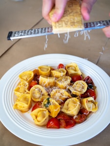 sliced fruit on white ceramic plate