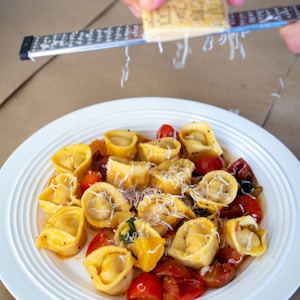 sliced fruit on white ceramic plate