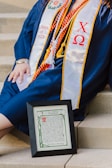 person holding black and white book