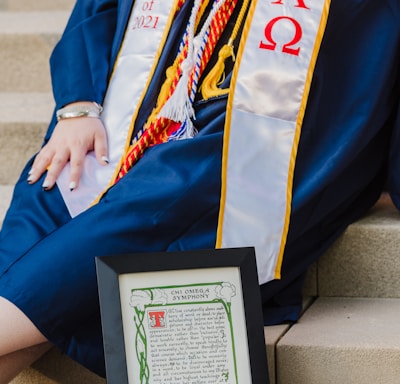 person holding black and white book