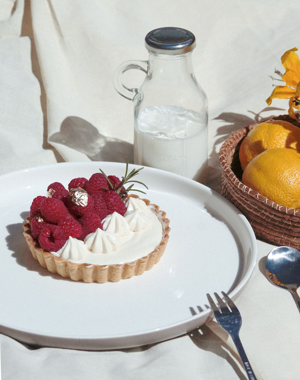 strawberry cake on white ceramic plate