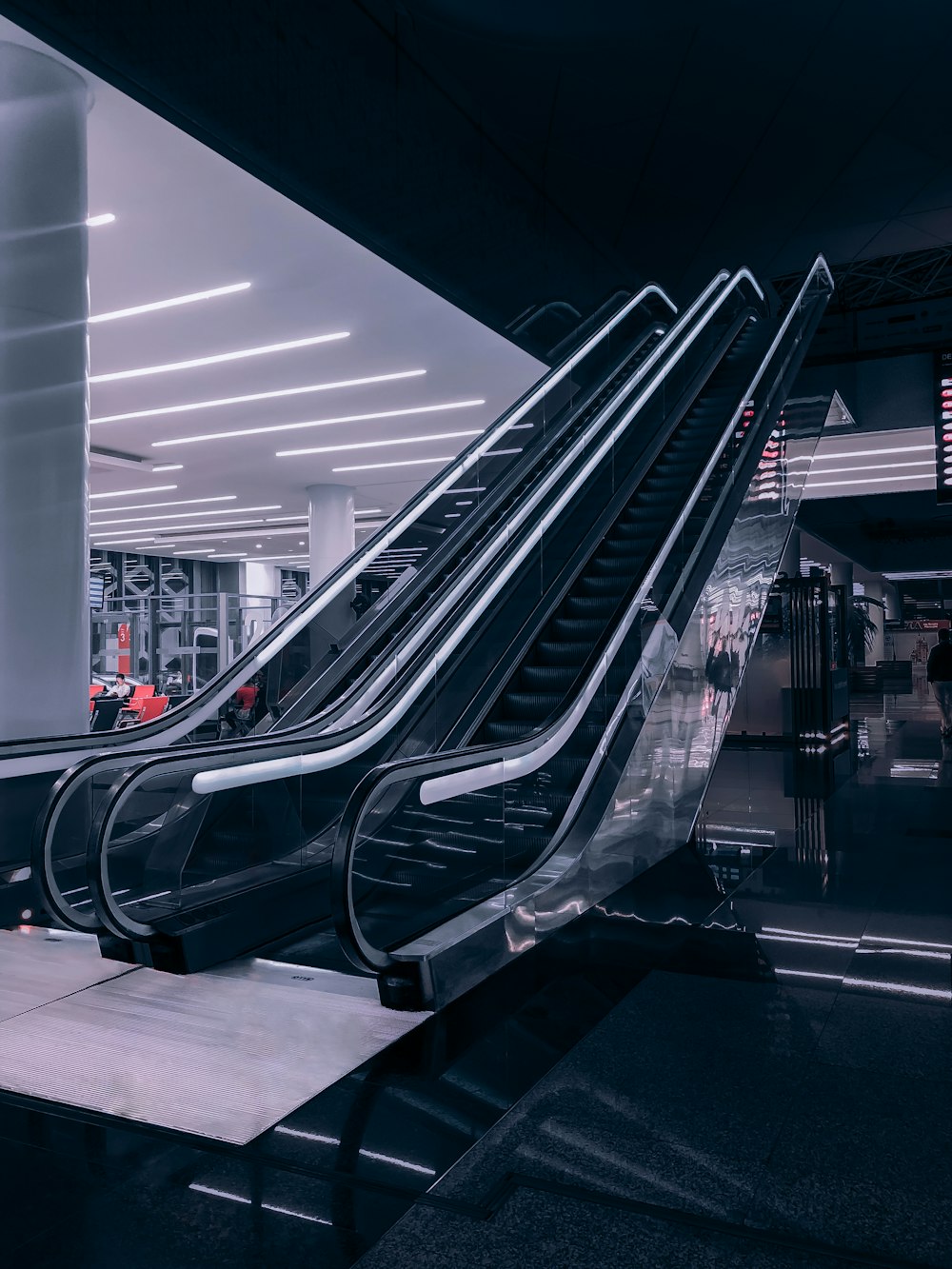 black escalator in a building