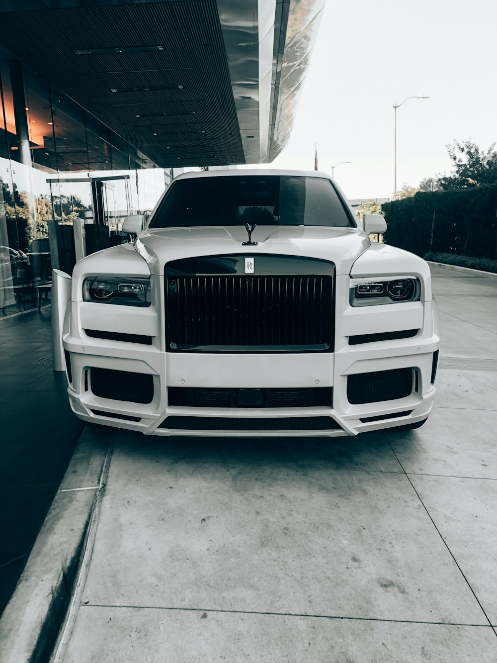 white car parked on parking lot