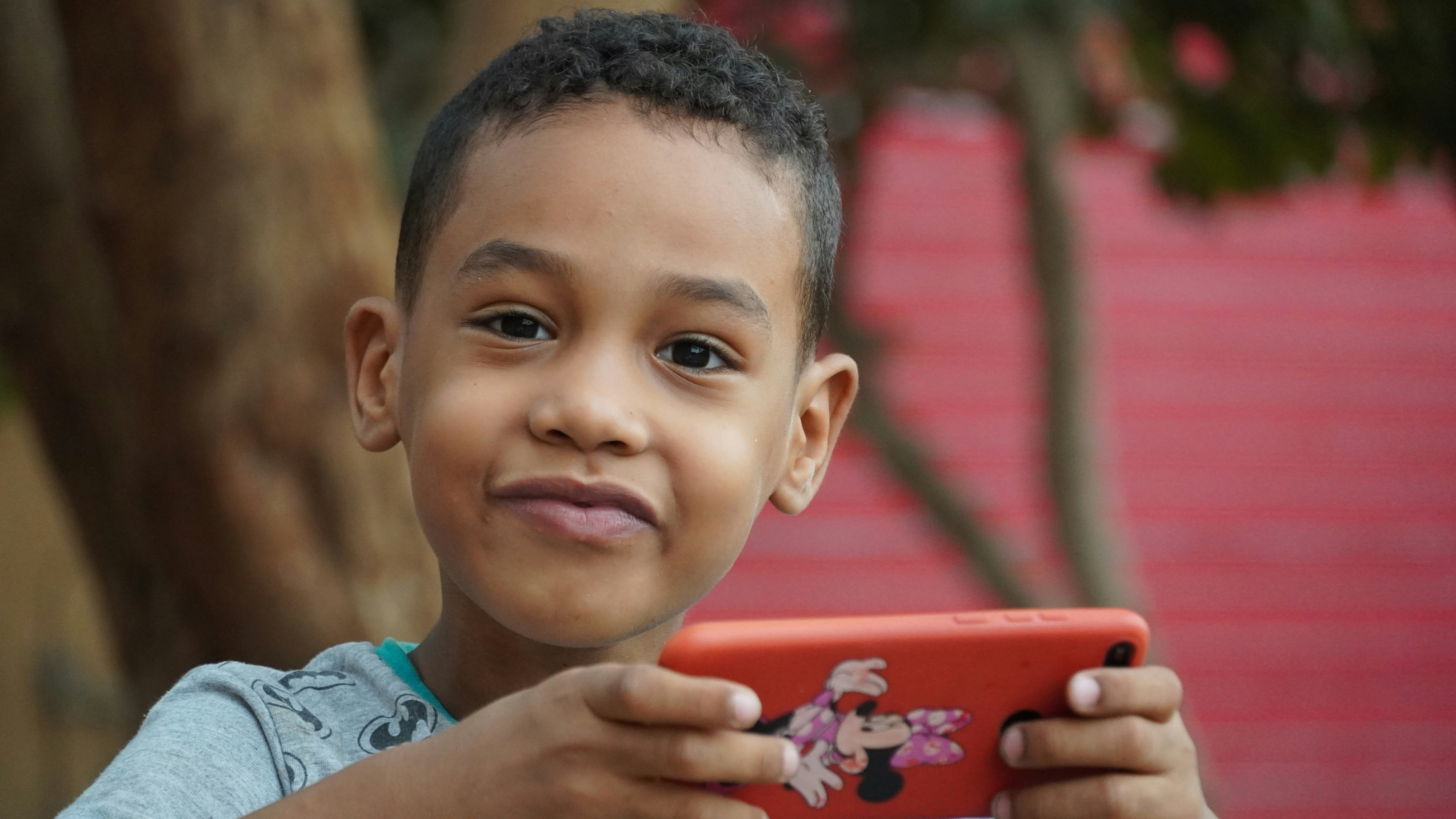 boy in blue and white crew neck shirt