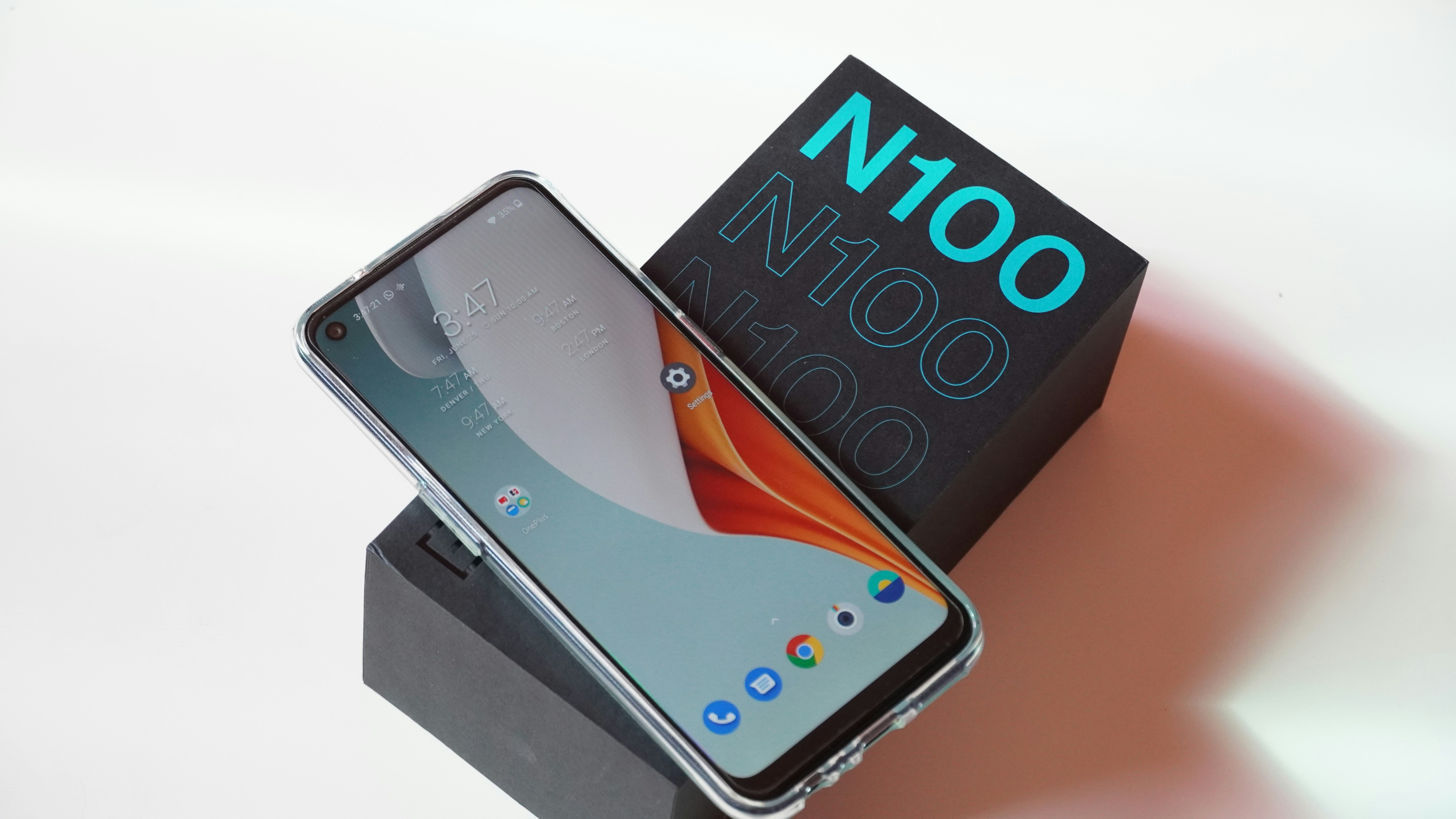 black android smartphone beside black and red box