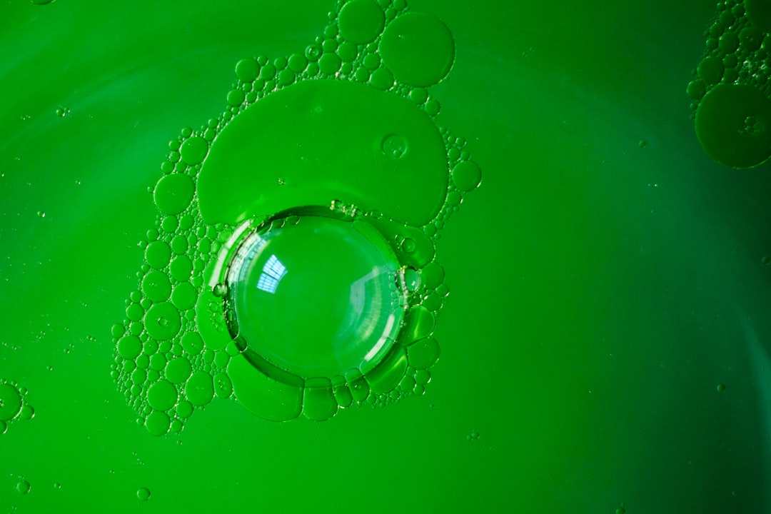 water droplets on green surface