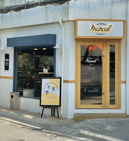 Marcel Acha warmly greeting clients in a cozy Texas neighborhood.