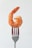 orange clay on stainless steel fork