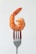 orange clay on stainless steel fork