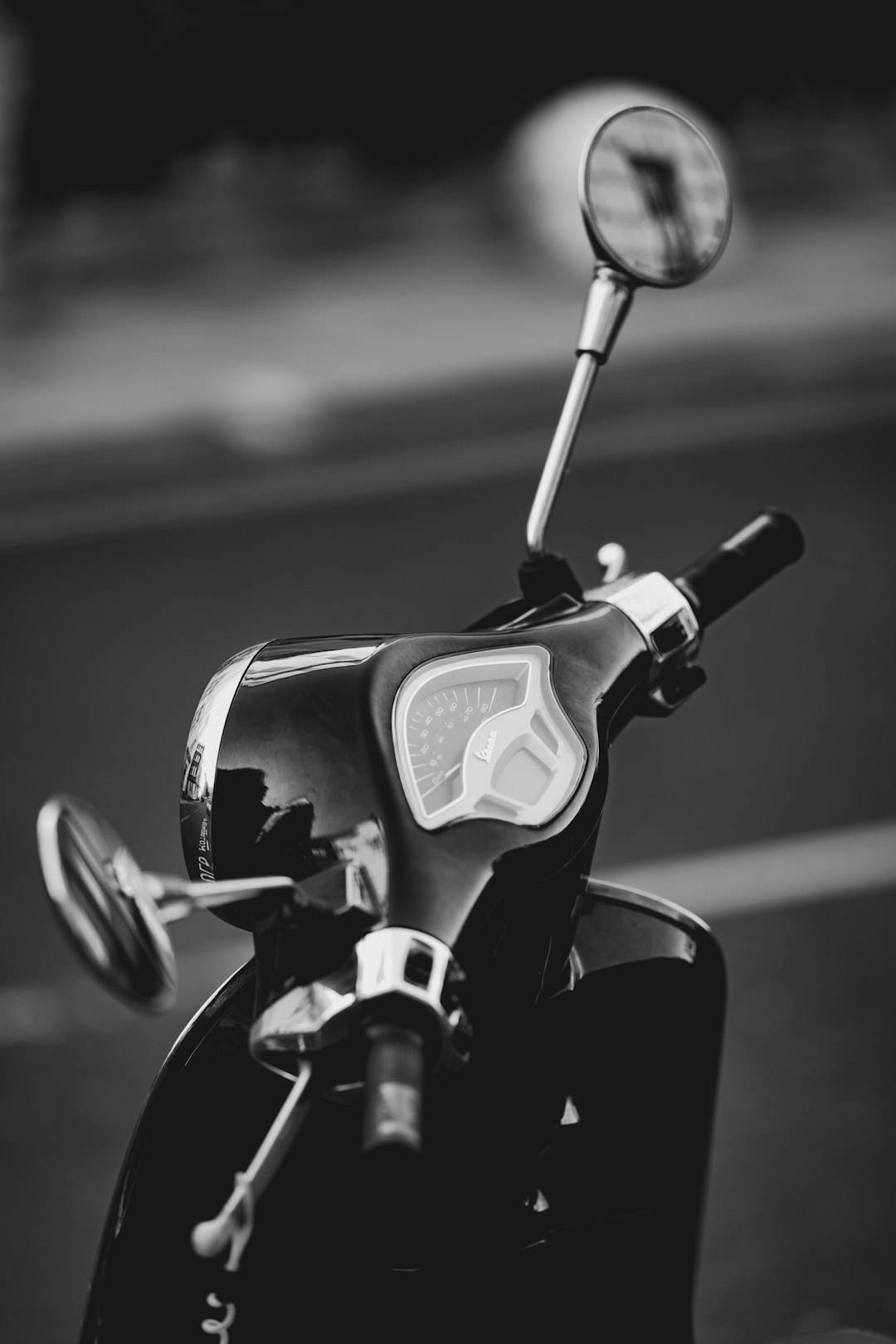 grayscale photo of motorcycle gear shift lever