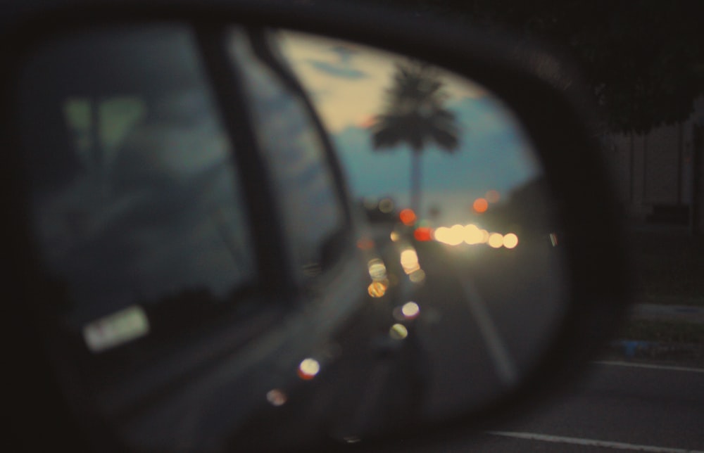 car side mirror showing car