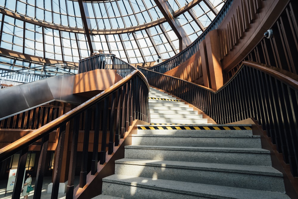 brown wooden staircase in building