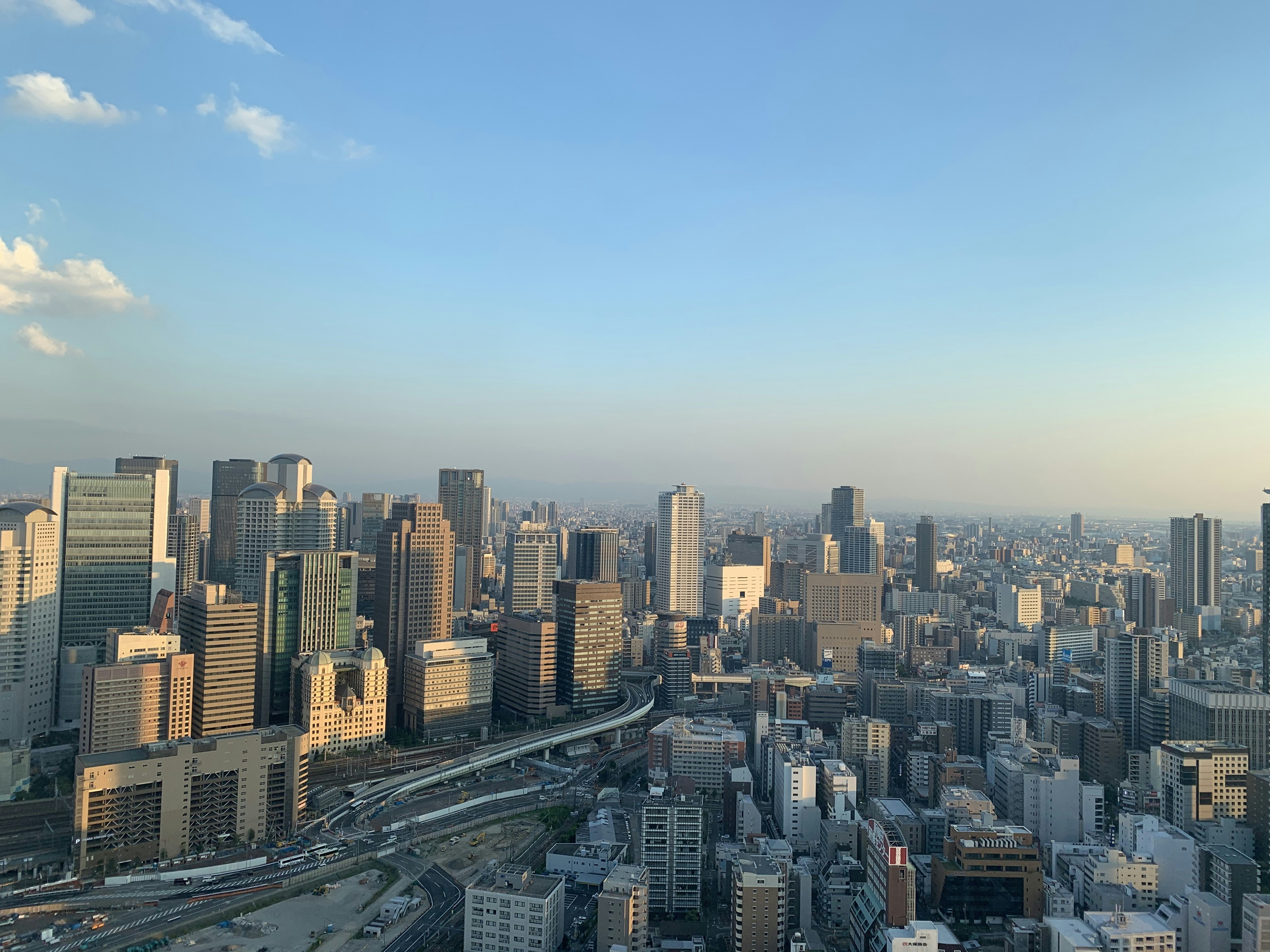 city buildings under blue sky during daytime