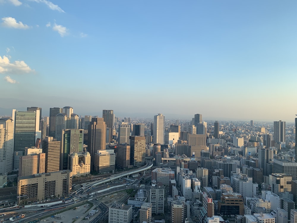 city buildings under blue sky during daytime