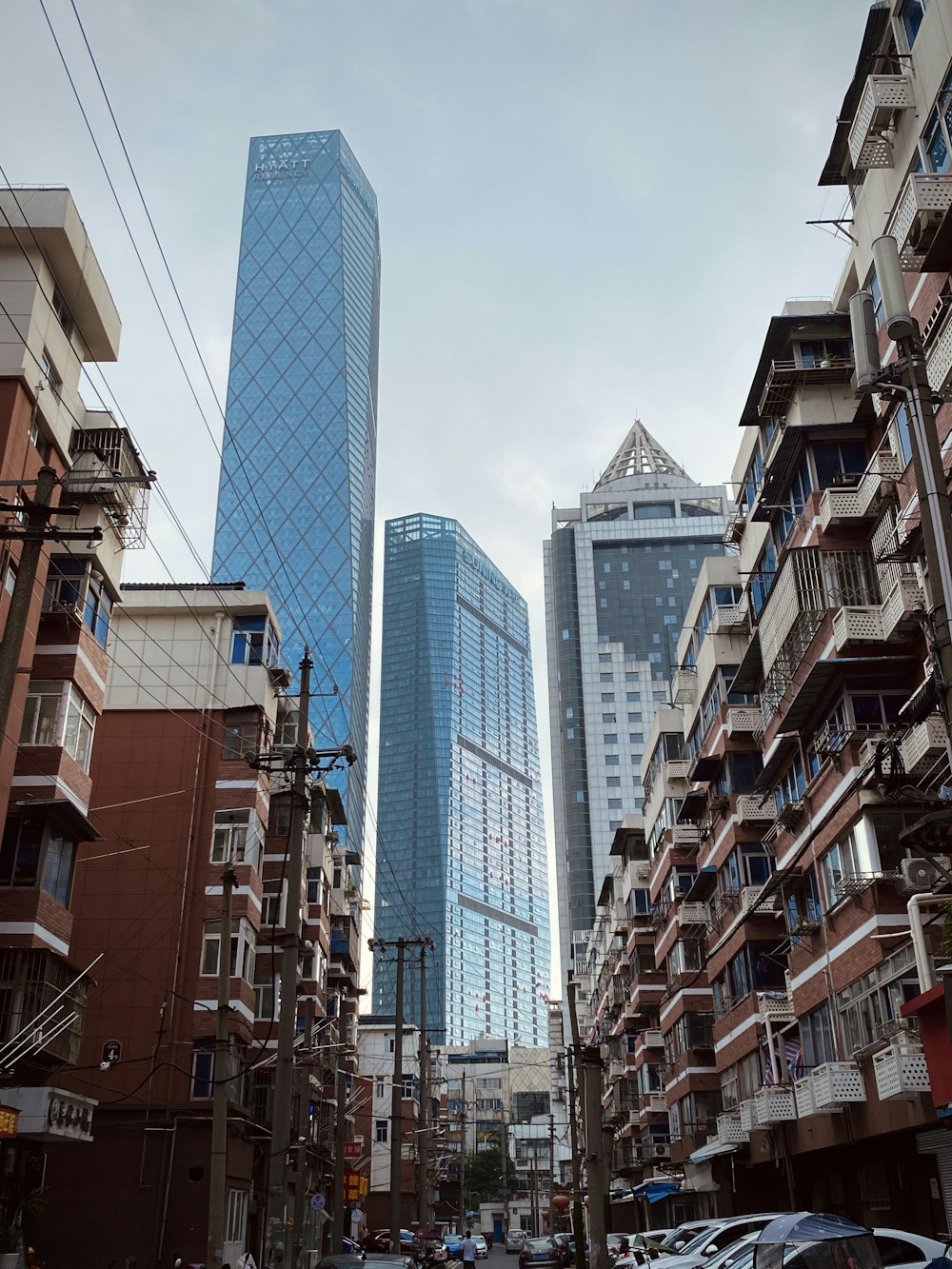 blue high rise building during daytime