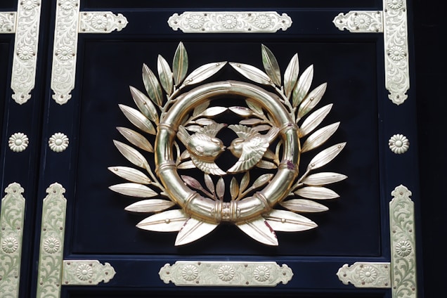 An elegant black and gold logo of Castrian Consortium.