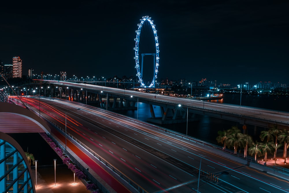 time lapse photography of cars on road during night time