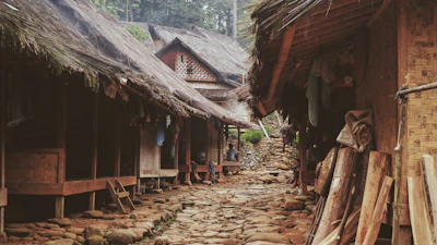 Travelers experiencing traditional Sasak village life in Lombok with local guides.