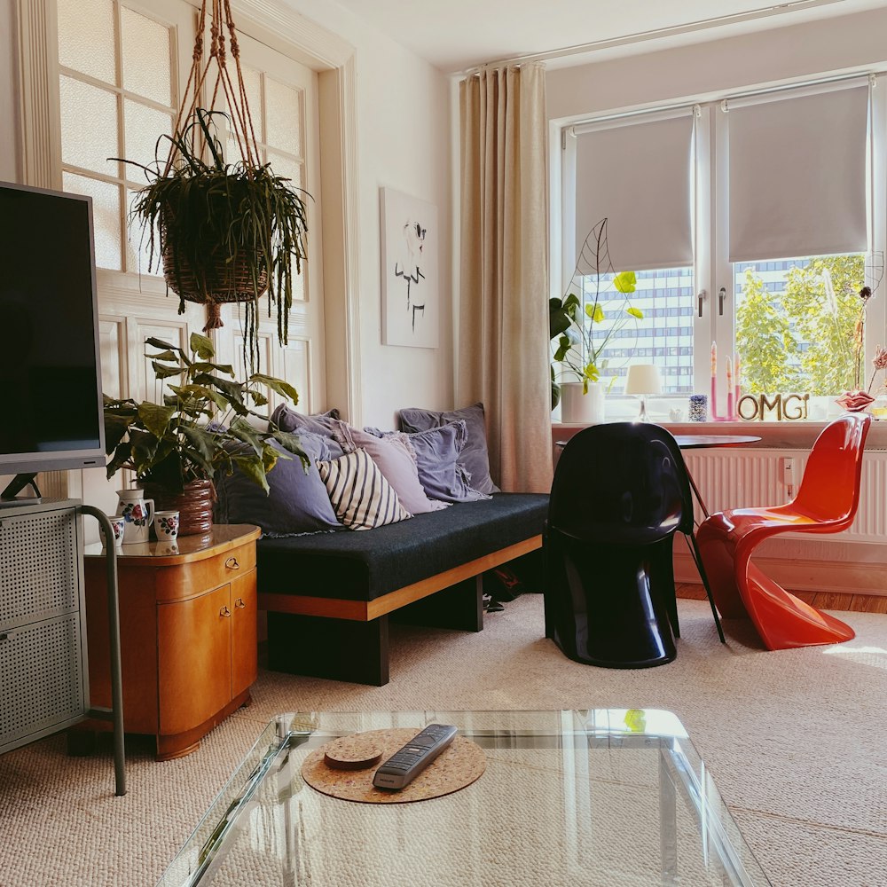 black and brown sofa near brown wooden table