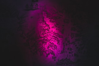 Elegant dark navy world map with subtle gold trade routes glowing softly.