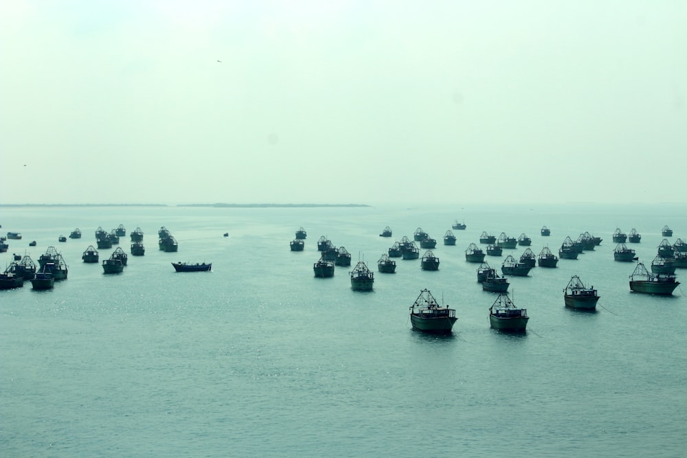 boats on sea during daytime