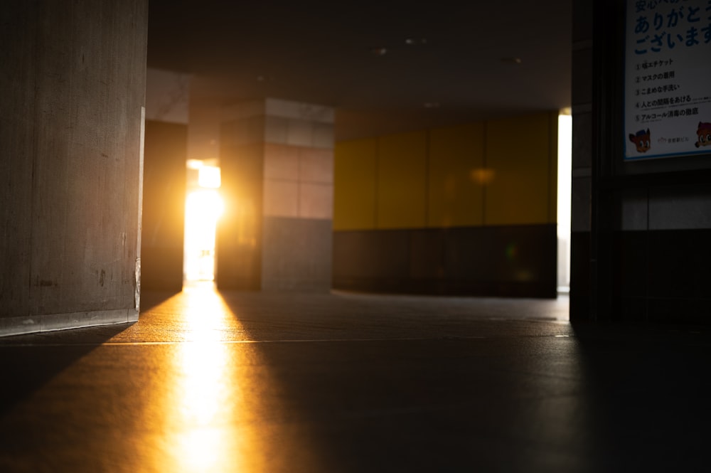 white and brown hallway with lights turned on during night time