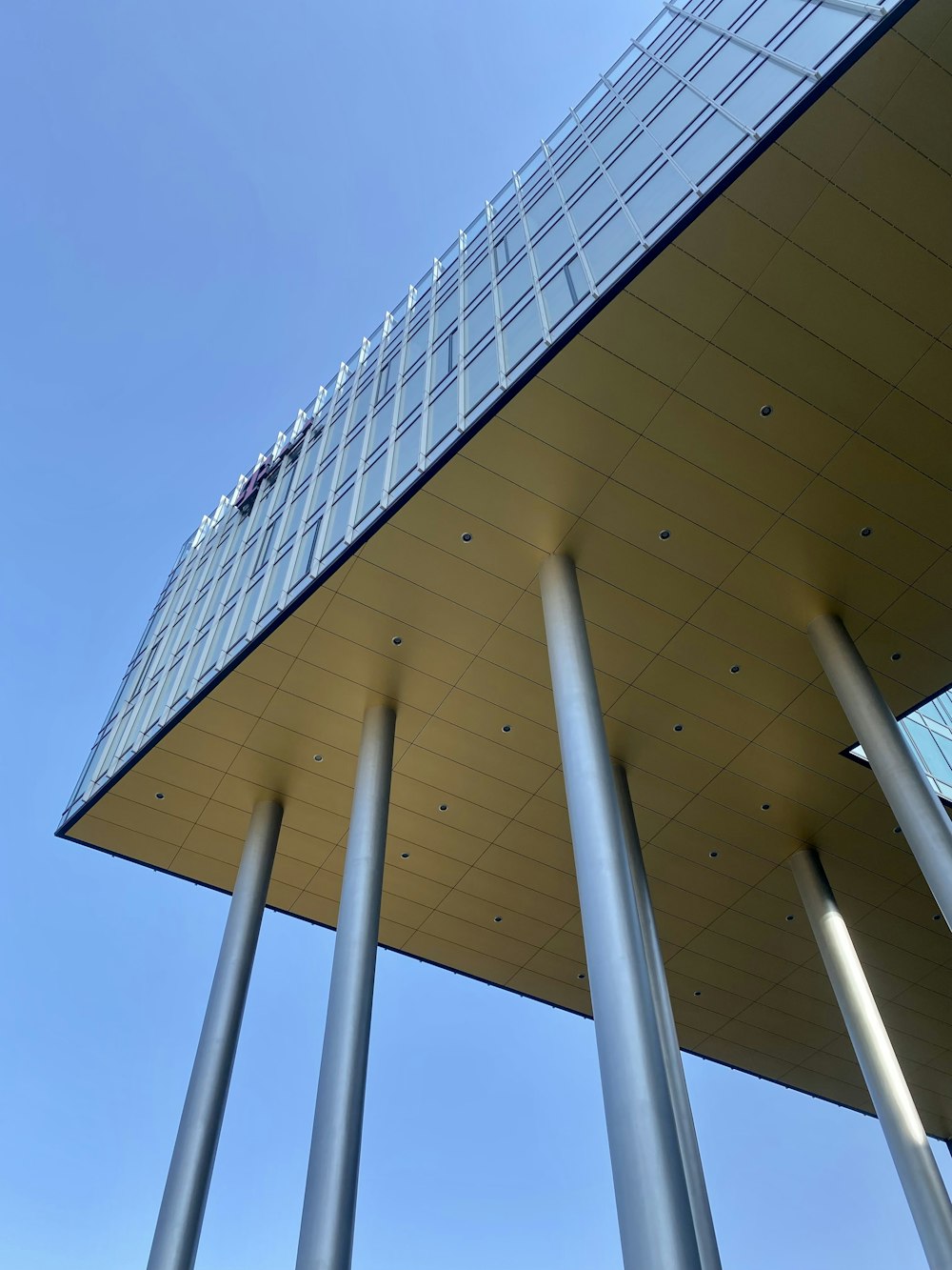 white concrete building under blue sky during daytime