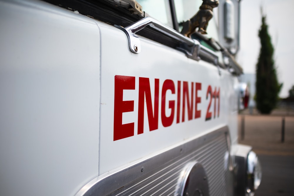 white and red truck with white and red sticker