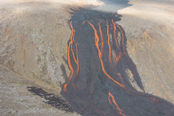 A close-up of molten lava flowing in the park.