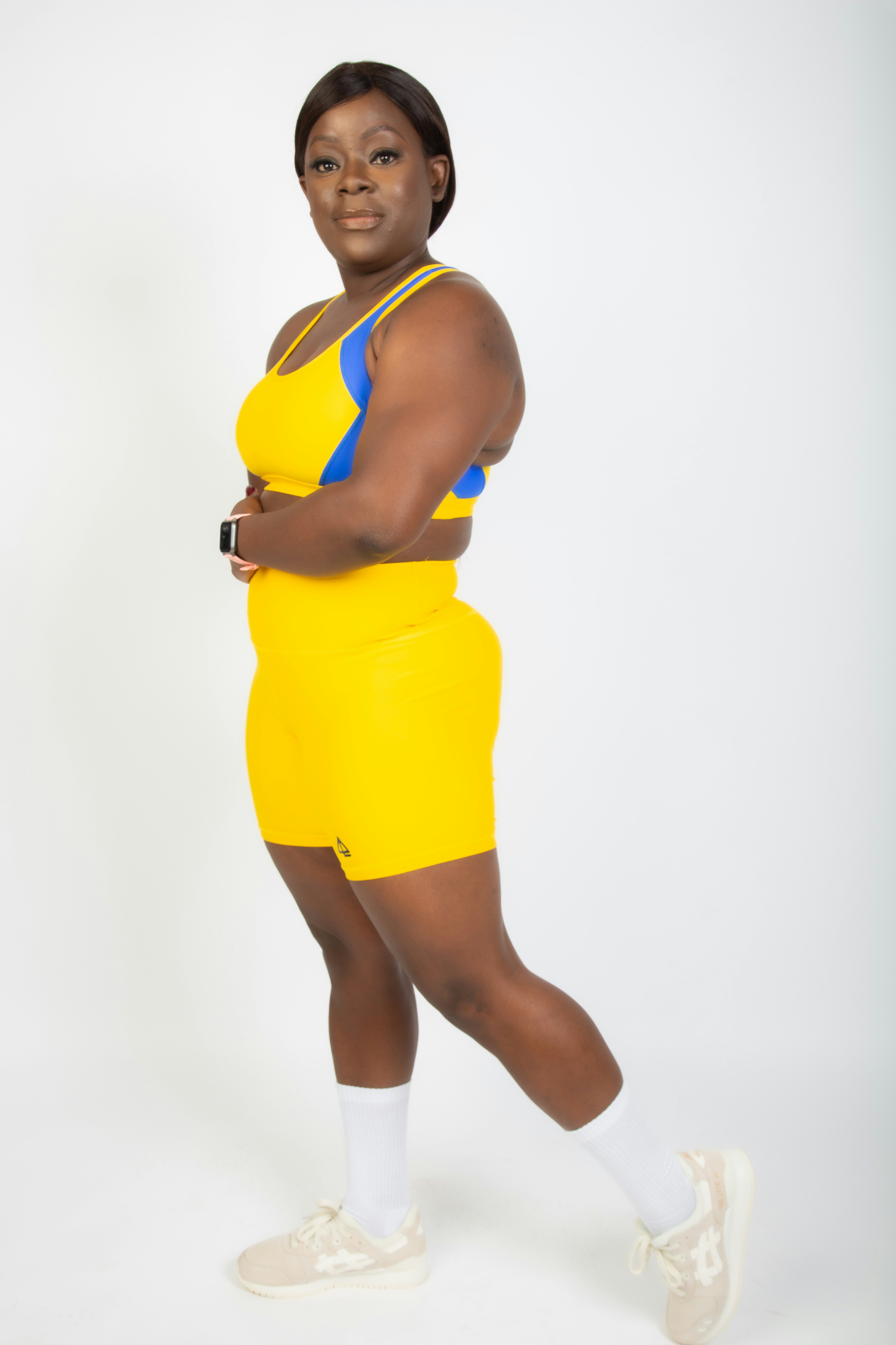 woman in yellow and blue tank top