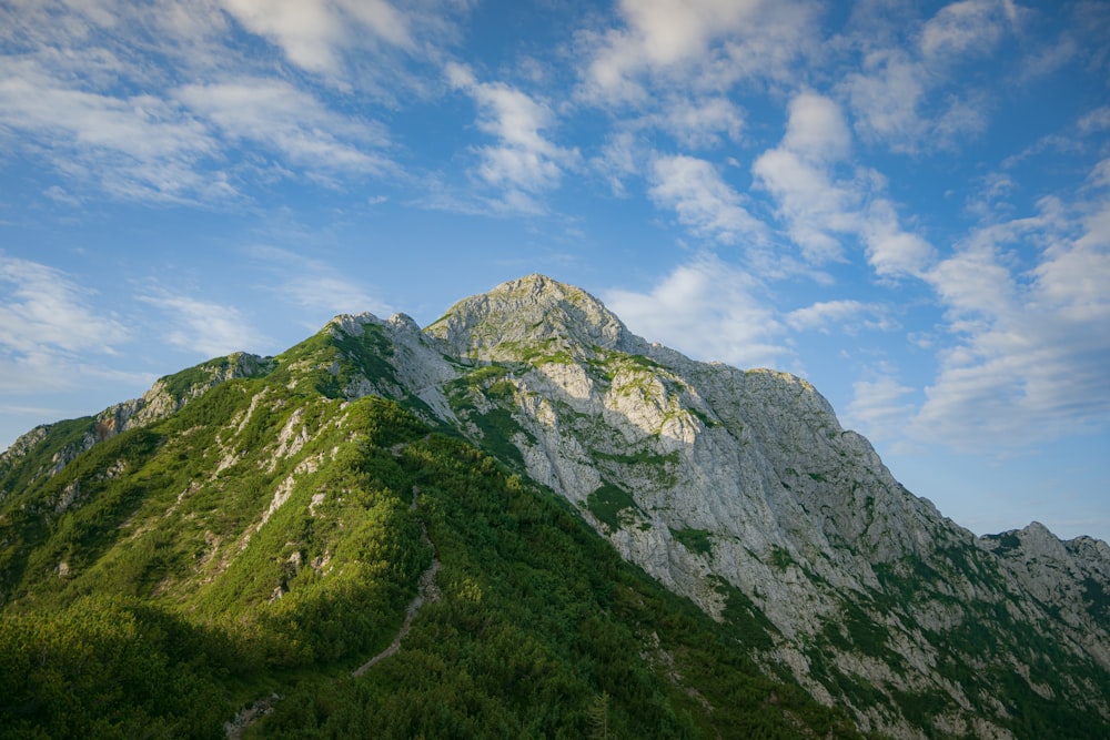 green and gray mountain under blue sky during daytime