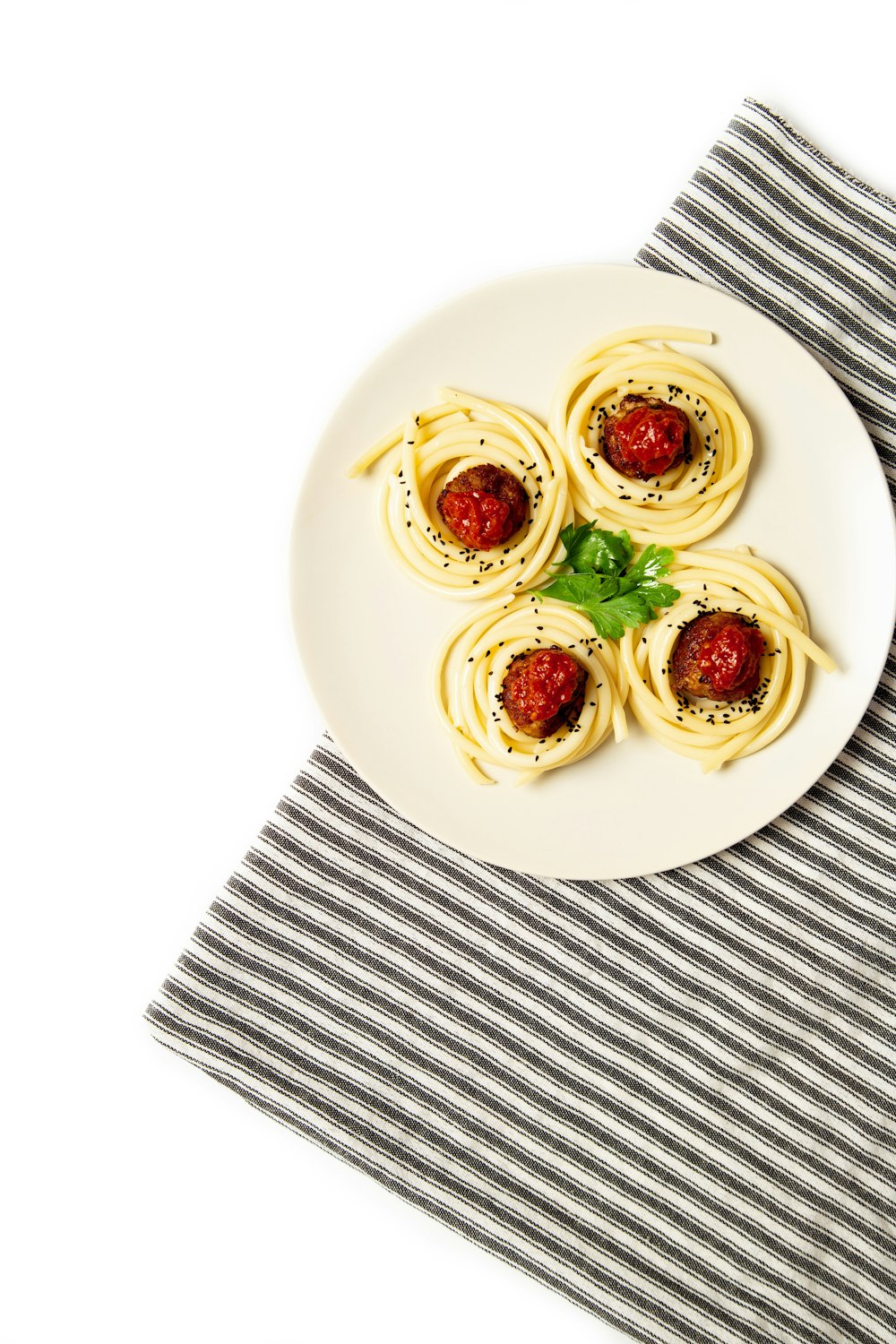 sliced tomato on white ceramic plate