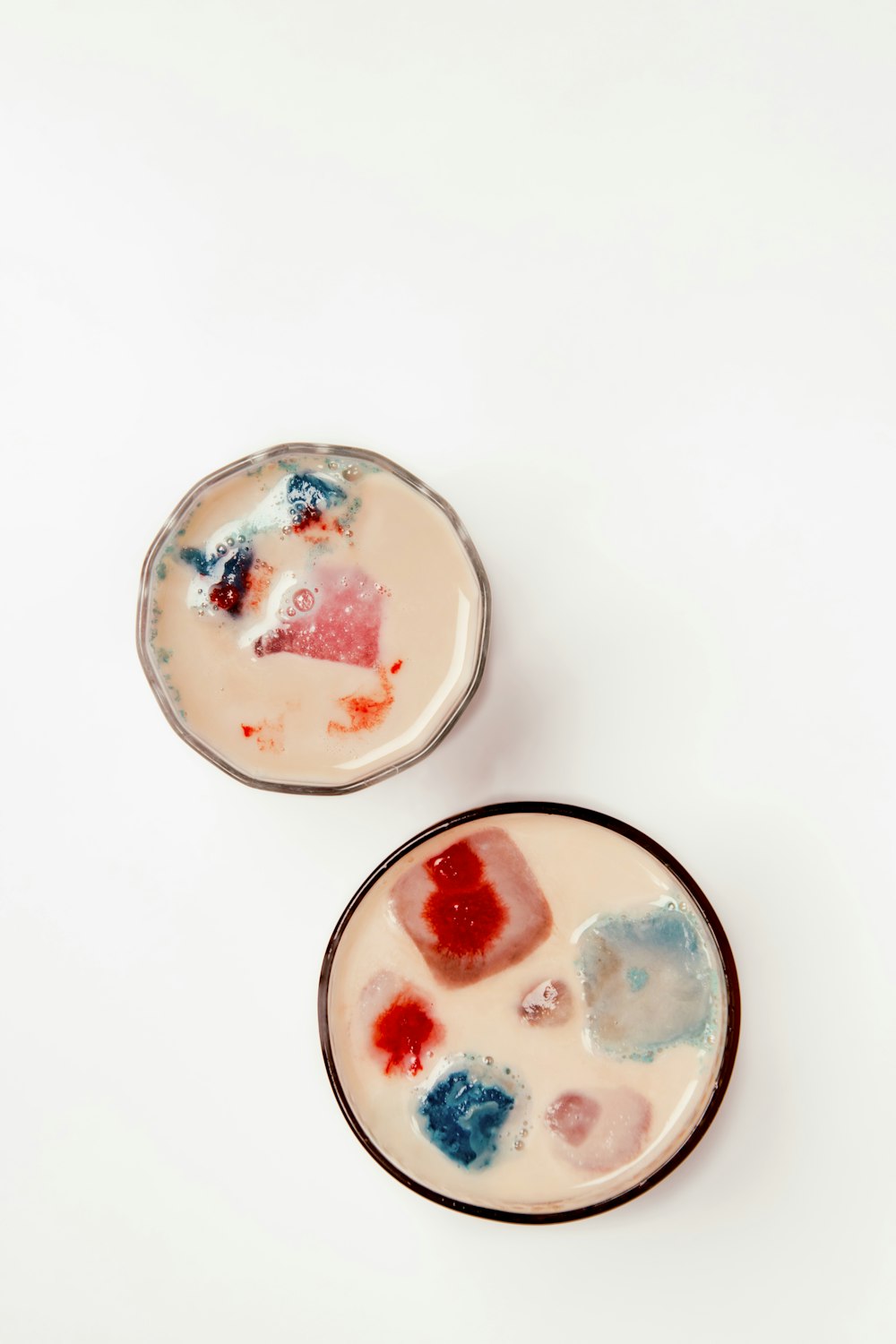 white and red floral ceramic bowls